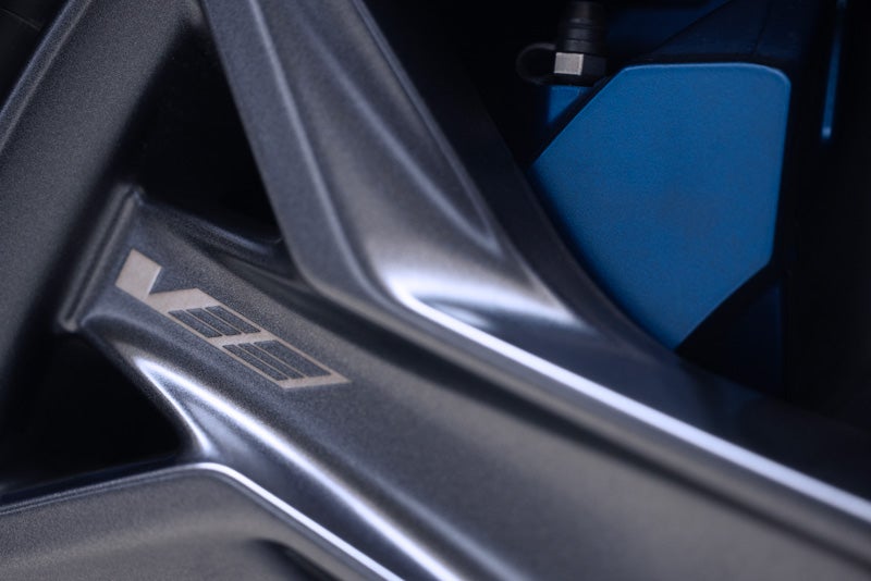 Close-up of the 2026 OPTIQ-V Brembo Performance Front Brakes | Vaughn Automotive - Cadillac of Ottumwa in OTTUMWA IA