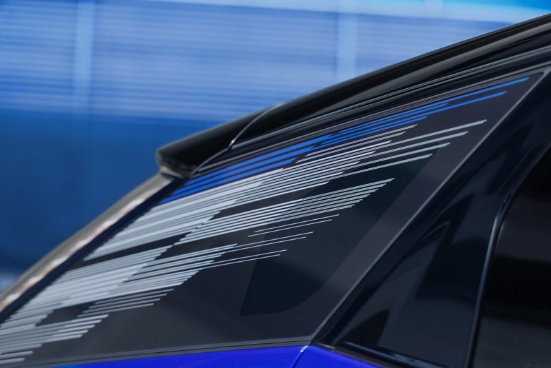 Close-up of the Modern Pattern on the 2026 OPTIQ-V Rear Quarter Glass | Vaughn Automotive - Cadillac of Ottumwa in OTTUMWA IA